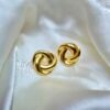 Gold twisted unique shape earring - Image 3